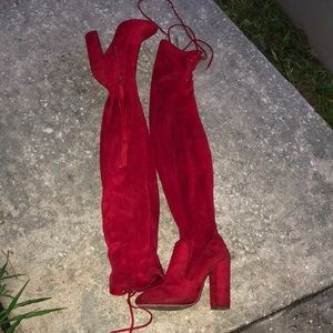 Red thigh high boots